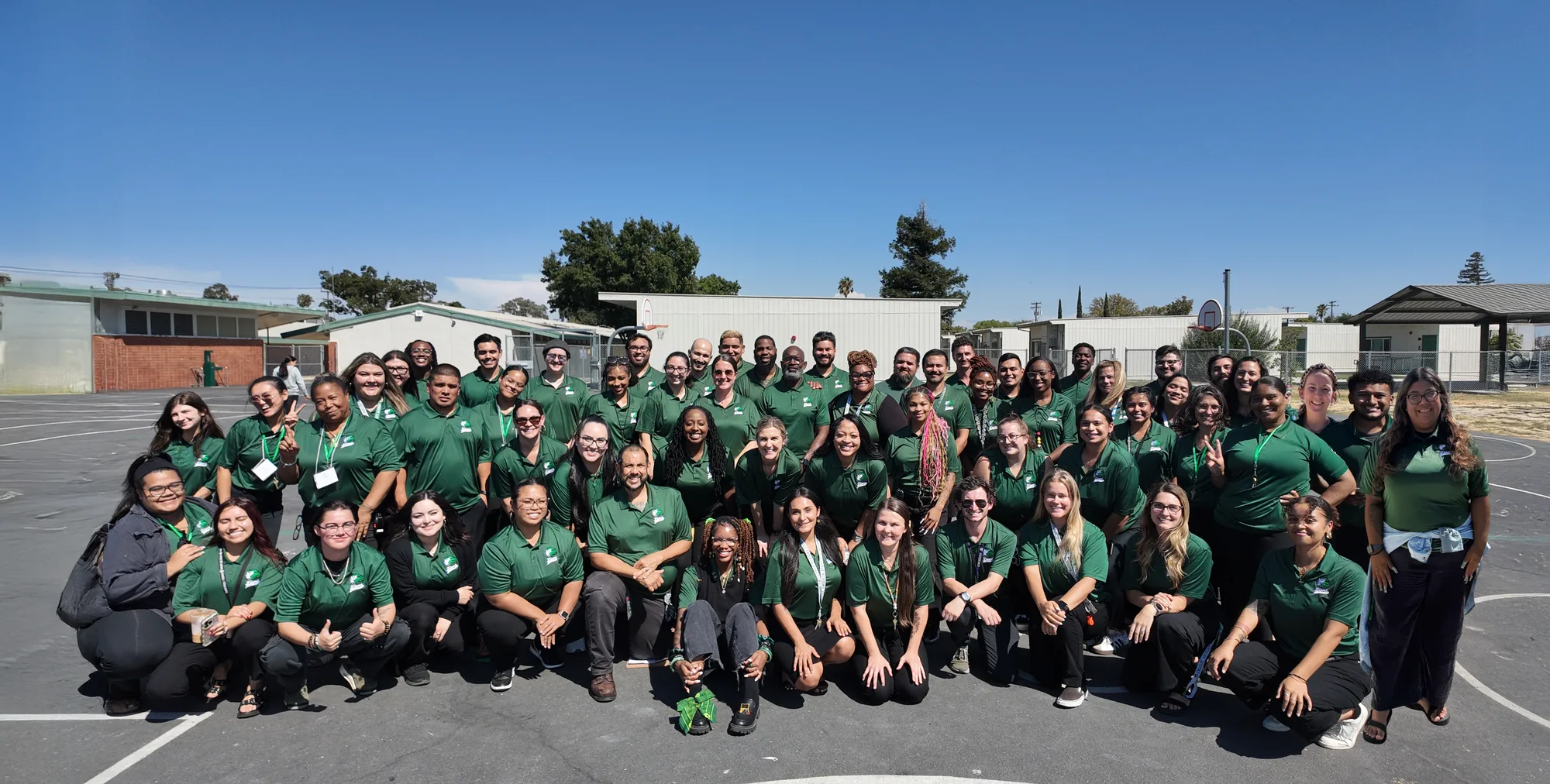The full Capitol Collegiate Academy staff on the school blacktop